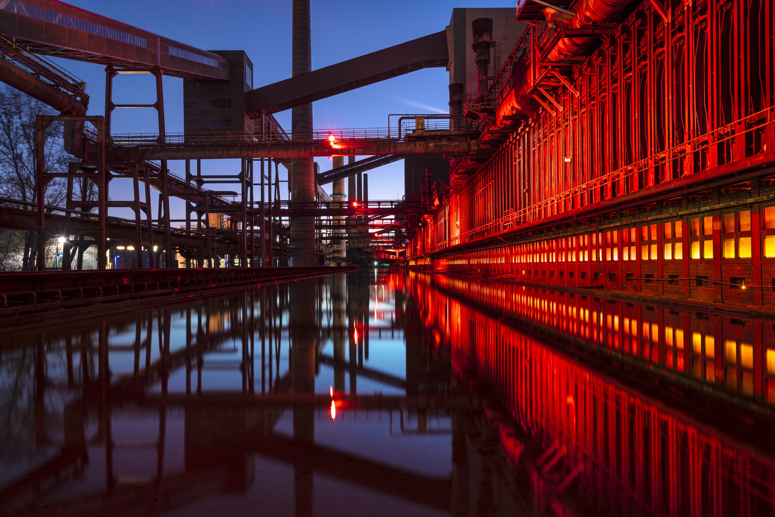 red and black bridge over water